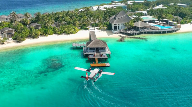 Malediven Insel mit Wasserflugzeug